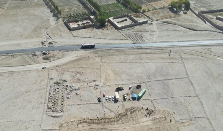 Photo showing the construction site of Hojajullah Jalal Foundation's CHC Clinic in Ghazni, with workers busy constructing the building structure.